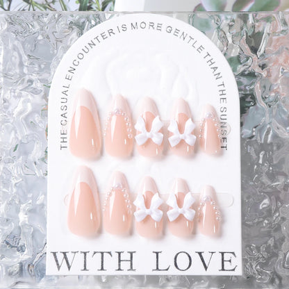 24pcs(+Tools) Pearl Bow Nude Pink Press On Nails White French Fingertips Almond Full Cover Fasle Nails New Year Nail Accessories.
