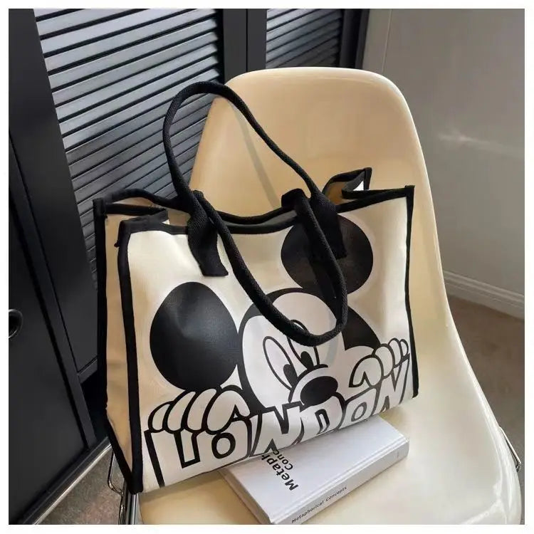 New Disney  Mickey Canvas Bag Women's Versatile Casual Shoulder Bag Commuter Handbag Large Capacity Multifunctional Mommy Bag.
