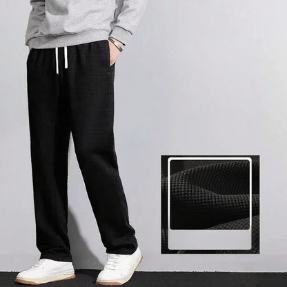 Men's retro knitted Waffle sweatpants, loose straight leg solid color pants with elastic waist and drawstring, suitable for autu.