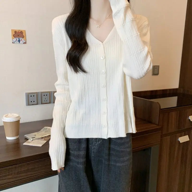 Women's Long-sleeved Button Cardigan Solid Color Casual Loose Fashion Top.