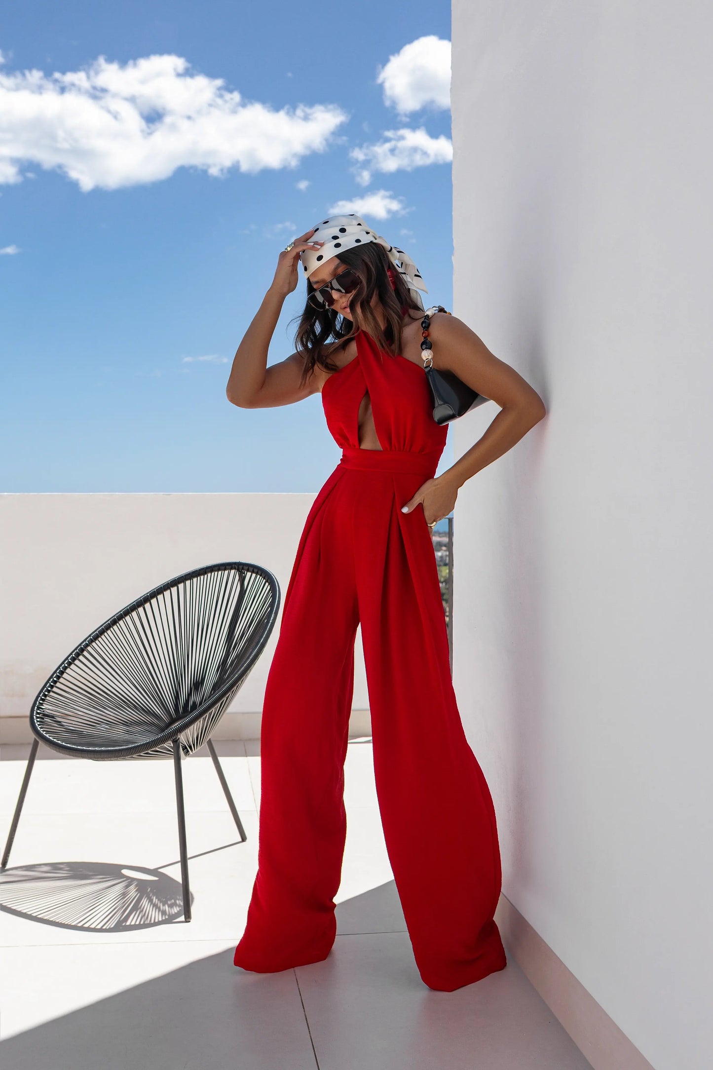 2025 Summer Female Jumpsuits Solid Color Hollow Out But Cross Halter Collar Backless Sexy Lady Wide Legs Jumpsuit Long Pants.