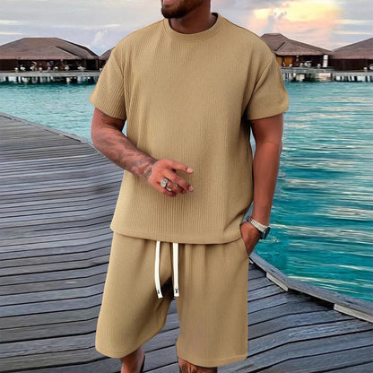 2-piece men's short sleeved shorts set, made of jacquard fabric suitable for fitness, running, and outdoor leisure activities.