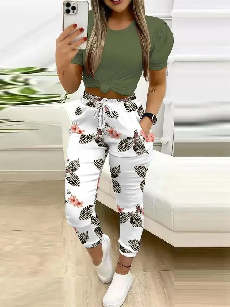 Summer Women's New Short Sleeved Pants Two-piece Commuting Fashion Printed Drawstring Sexy Exposed Waist Pants Set.