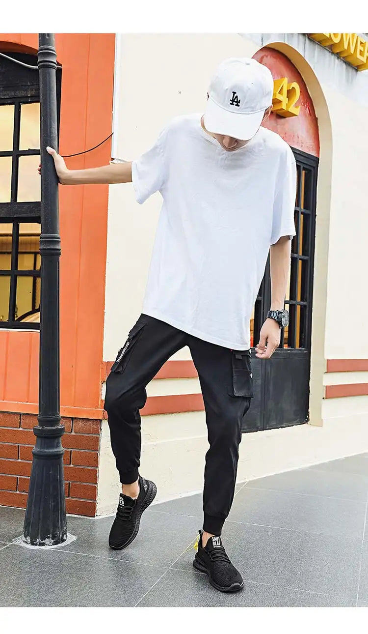 Men's sneakers lace-up flying woven through casual shoes vulcanized lightweight flat comfortable running shoes plus size 48.