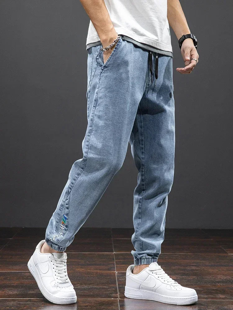 Spring Summer Jeans Men Fashion Tapered Harem Denim Pants Casual Jogger Baggy Jean Trousers Male Plus Size 5XL Streetwear.