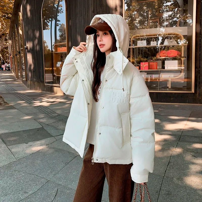 2024 Winter Neue frauen Unten Baumwolle Gefütterte Jacken Stilvolle Mit Kapuze Einfarbig Casual Verdicken Warme Lose anliegende kurze Mäntel