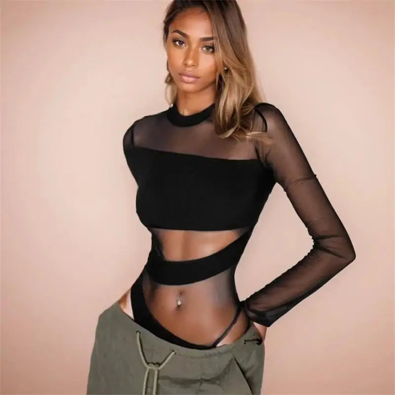 Spring Summer New Fashion Cut Cross Hollow Mesh Jumpsuit Long-Sleeved Thin O Neck Diagonal Black Charming Bodysuit Clubwear.