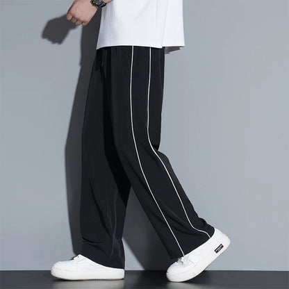 Summer ice silk thin section pants men's Hong Kong style loose splicing casual sports wide-legged pants elastic speed pants
