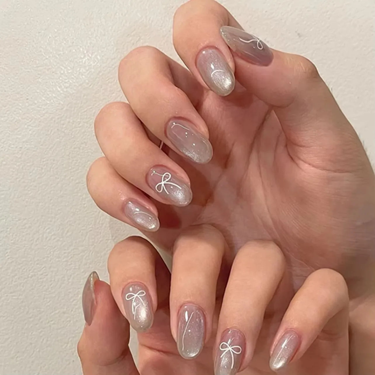 White Glitter Powder Bowknot Long Pointed Fake Nails Art Ballet False Nail Cow Print Pearl Rhinestone Pink Almond Press on Nails.