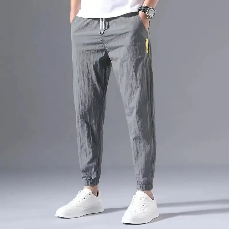 Sommer neue Mode Trend lose große dünne Eis Seide atmungsaktive koreanische Sport lässig neun Punkt Hosen 90er Jahre Vintage-Kleidung.