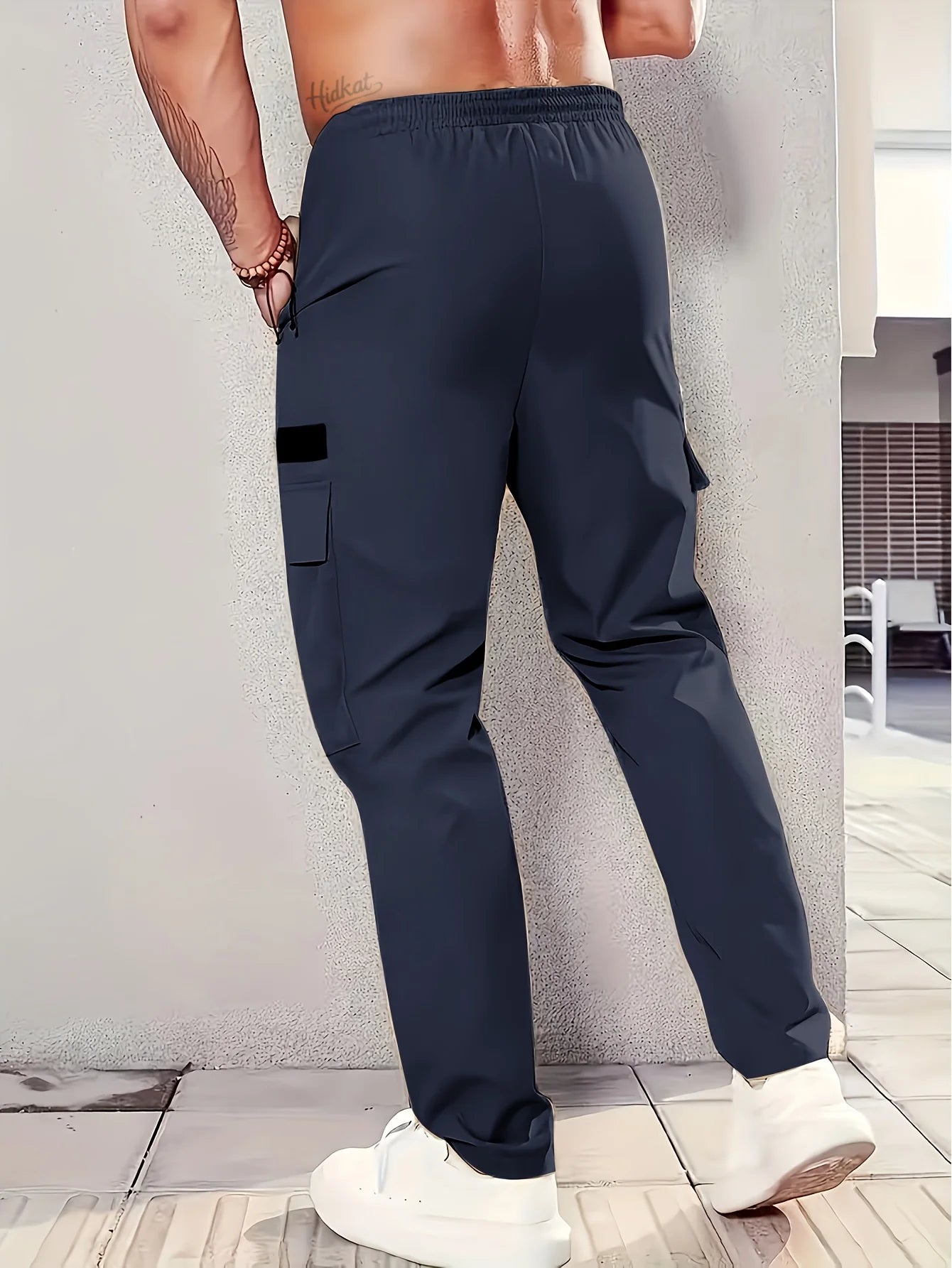 Outdoor-Arbeitshose für Herren – strapazierfähiges Polyester, mehrere Taschen, elastischer Bund mit Schlaufen, leicht und atmungsaktiv.