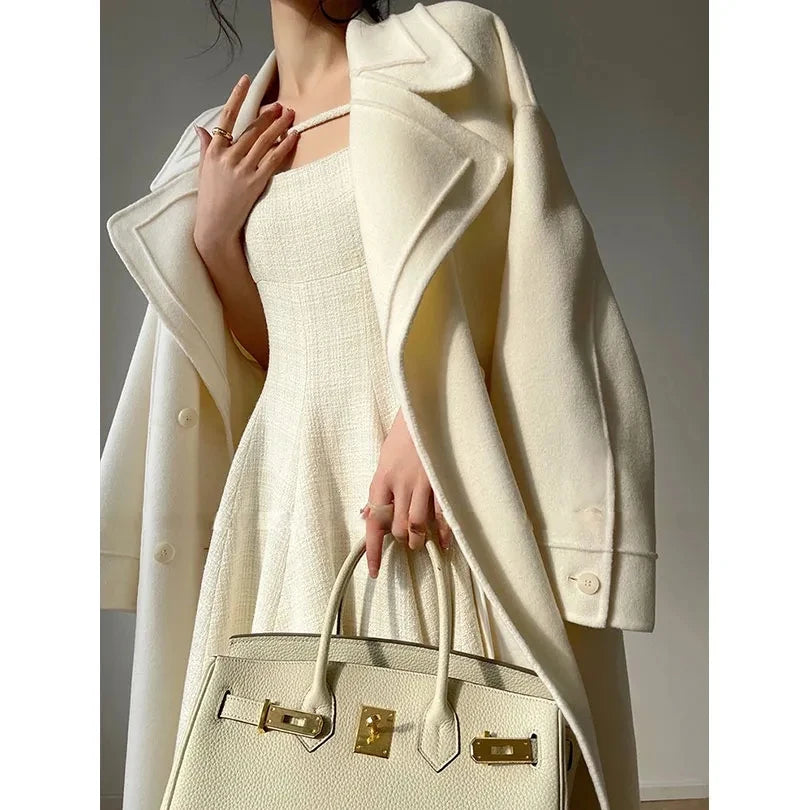Weißer Mantel im französischen Stil, High-End-Temperament, Herbst-Winter, langer Wollmantel, 2025, neuer Damen-Wollmantel, modische lose Oberbekleidung.
