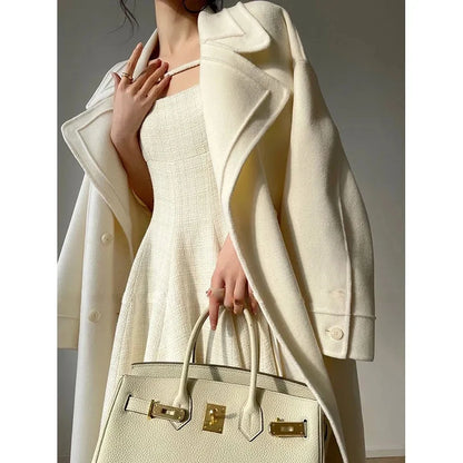 Weißer Mantel im französischen Stil, High-End-Temperament, Herbst-Winter, langer Wollmantel, 2025, neuer Damen-Wollmantel, modische lose Oberbekleidung.