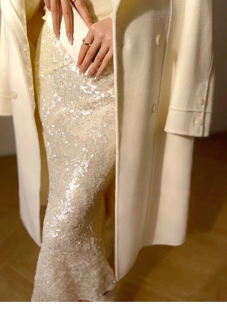 Weißer Mantel im französischen Stil, High-End-Temperament, Herbst-Winter, langer Wollmantel, 2025, neuer Damen-Wollmantel, modische lose Oberbekleidung.