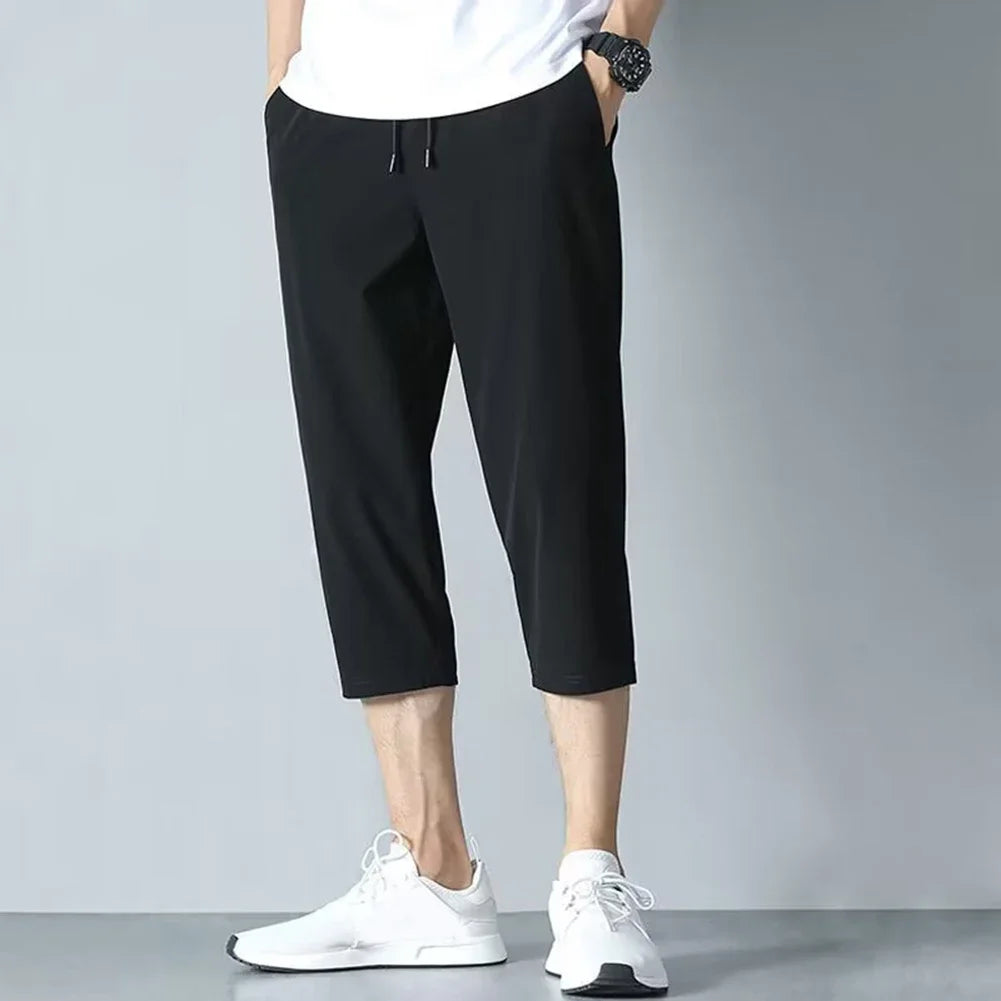 2025 New Summer Men's Ice Silk Pants Hong Kong Style Trendy Loose-Fit Straight-Leg Cropped Pants Korean Version Casual Pants.