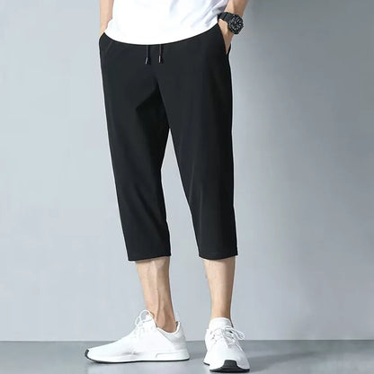 2025 New Summer Men's Ice Silk Pants Hong Kong Style Trendy Loose-Fit Straight-Leg Cropped Pants Korean Version Casual Pants.