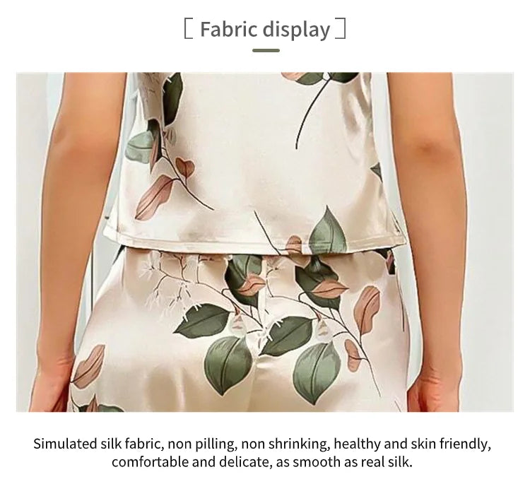 Elegantes Damen-Pyjama-Set aus Satin mit Blattmuster, V-Ausschnitt, Cami-Oberteil und elastische Hose für bequemen Schlaf und Faulenzen.