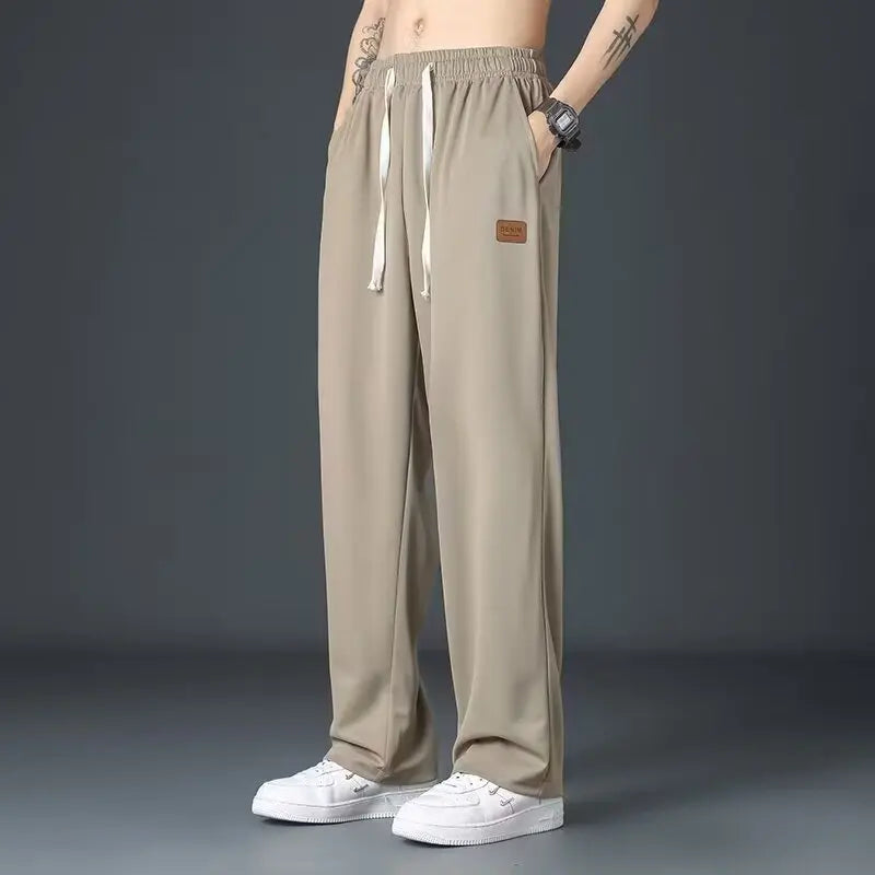 Casual long pants for boys, ice silk quick drying pants for spring and summer, thin, trendy brand straight tube, loose, hanging.