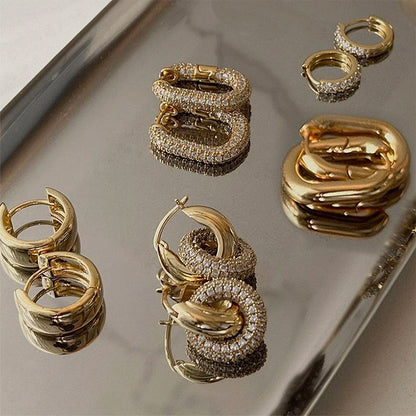Fashion CZ Zircon Round Huggie Hoop Earrings for Women Geometric U Shape Ear Buckle Hoops Gold Plated Stainless Steel Jewelry.