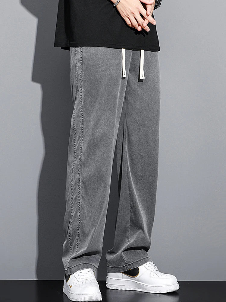 2024 Spring/Summer New Soft Lyocell Fabric Men's Jeans Thin Loose Straight Leg PantsDrawstring Elastic Waist Korean casual pants.