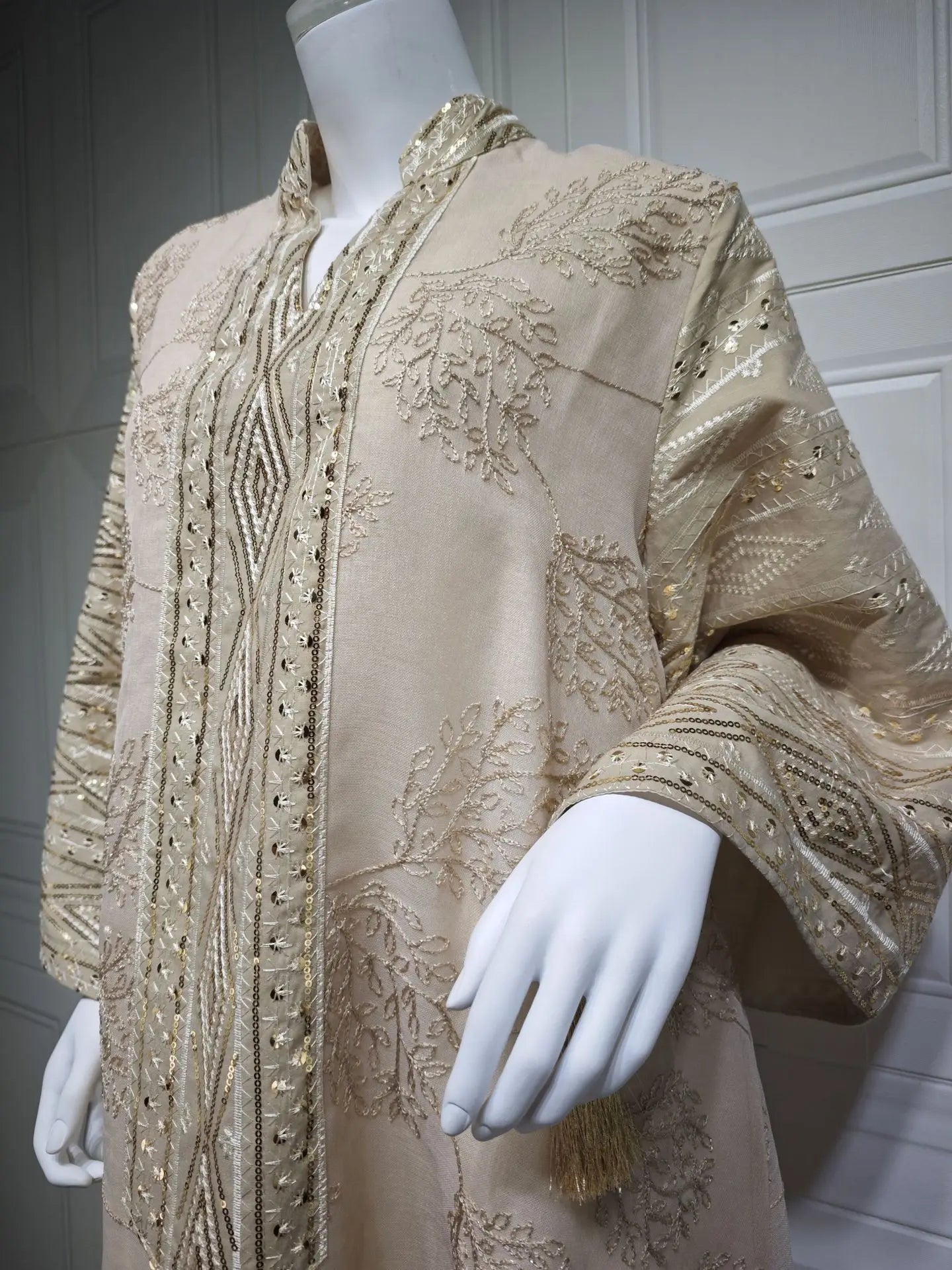 Muslim Women's Light Blue Islamic Embroidered Abaya with Gold Detailing Ideal for Formal Events in Middle East like UAE Saudi.