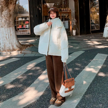 2024 Winter Neue frauen Unten Baumwolle Gefütterte Jacken Stilvolle Mit Kapuze Einfarbig Casual Verdicken Warme Lose anliegende kurze Mäntel