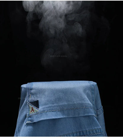 Summer Ultra Thin Men's Loose Jeans Lyocell Ice Silk Fashion Casual Business Denim Pants Straight Stretch Male Trousers.