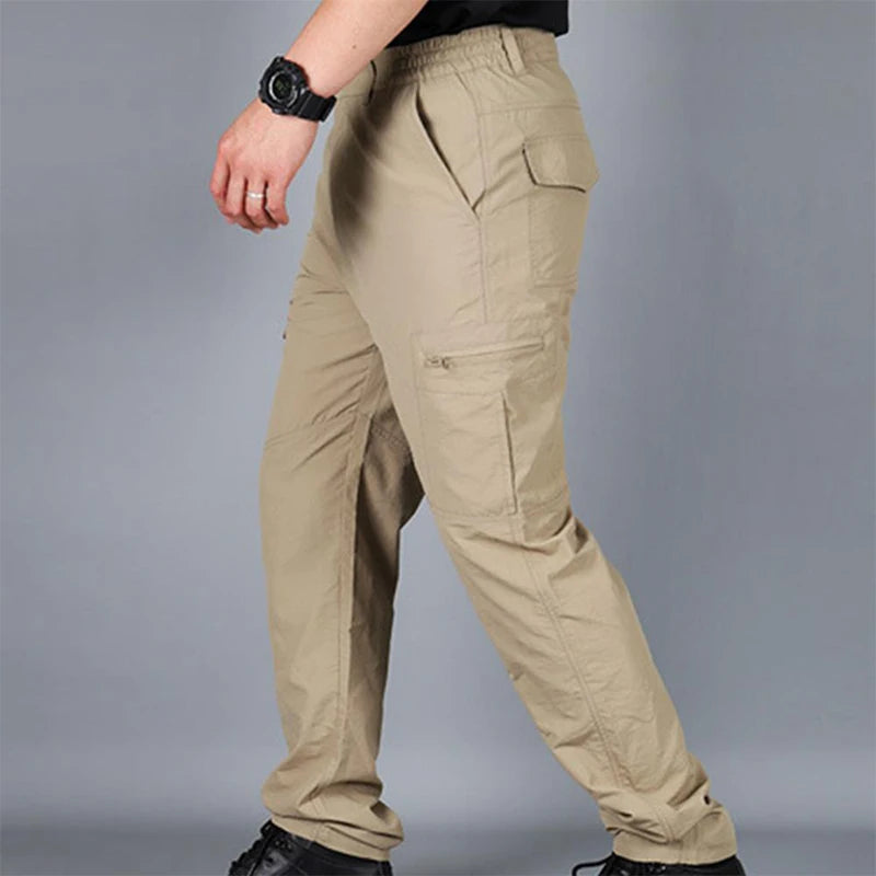 Summer Men's Quick Drying Pants Sports Outdoor Mountaineering Waterproof Large Size Multi Pocket Workwear Trousers.