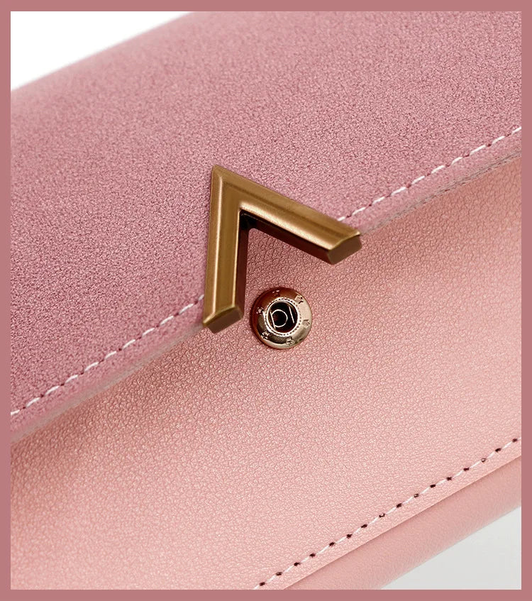 New Korean version women's wallet long V-shaped buckle three fold wallet for women, hand-held bag, change card bag.