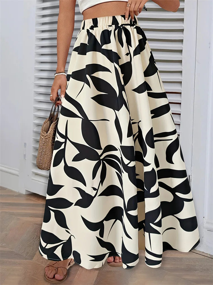 Fairyshely Casual Leaf Print Long Skirt For Women 2025 Summer Ruffle High Waist Maxi Skirt Ladies Elegant A line Pleated Skirt.