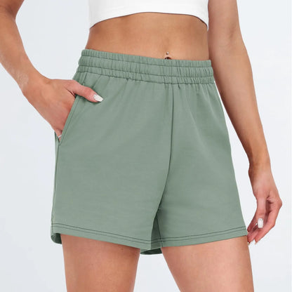Plain Color Sports Shorts Casual Summer Comfortable And Soft Elastic High Waist Running Shorts With Pockets For Women.
