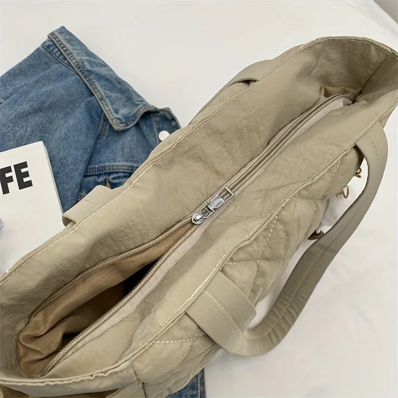 Black Large Capacity Handbag with Square Pattern, Durable Quilted Material, Multiple Pockets for Easy Storage & Cute Plush Charm.