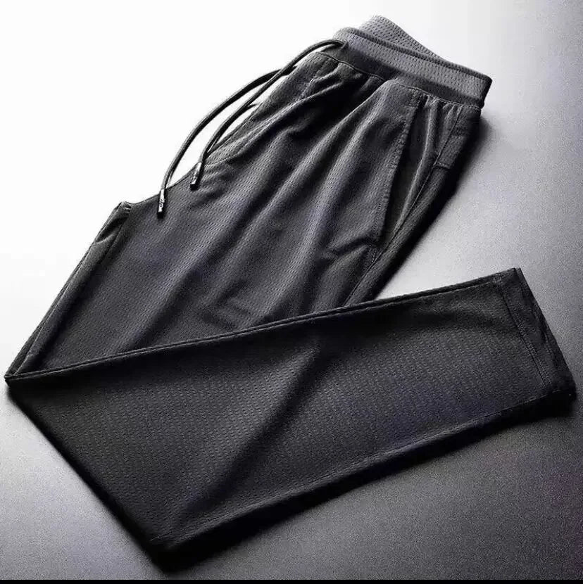 2024 New Ice Silk Pants Summer Thin Breathable Mesh Pants Men's Casual Ice Cold Men's Other Material.