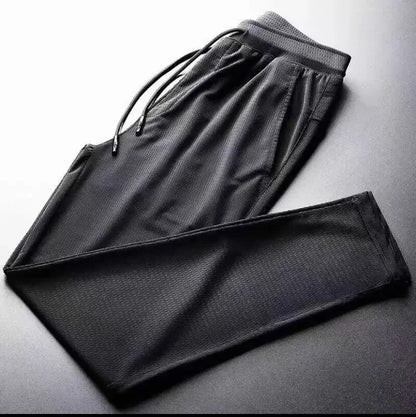 2024 New Ice Silk Pants Summer Thin Breathable Mesh Pants Men's Casual Ice Cold Men's Other Material.