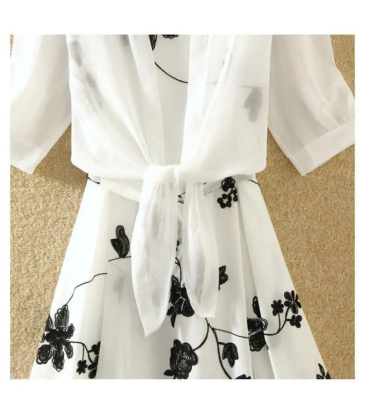 Neuer eleganter Anzug, zweiteiliges Kleid, hohe Taille, ärmellos, schlanker A-Linien-Rock, Blumenstickerei, weißes Oberteil, Schleife, Gürtel, Vintage-Frau.