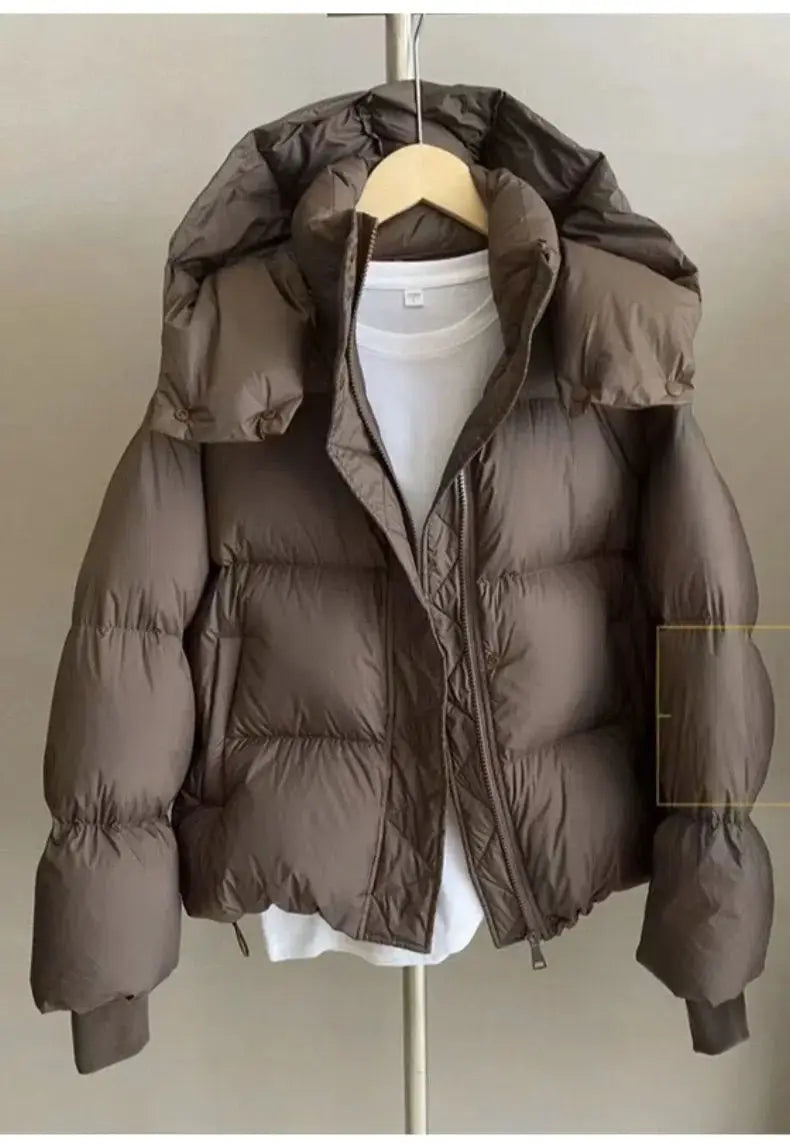2023 neue Winter Puffer Jacke Frauen Mode Mit Kapuze Unten Baumwolle Mantel Weibliche Lose Beiläufige Warme Parkas Oberbekleidung.