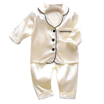 Koreanische Version des Kinder-Pyjama-Sets aus Seidensatin mit langen Ärmeln und Hose, zweiteiliges einfarbiges Cartoon-Set für männliche Babys.