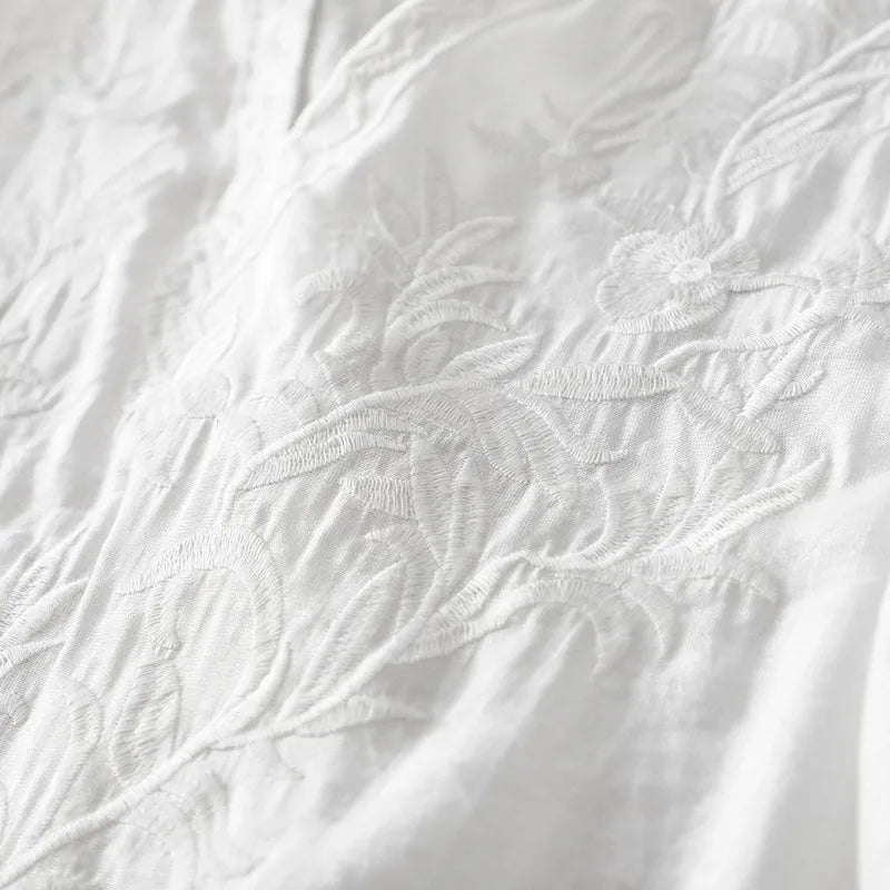 Neuankömmling 2024 Sommer Kunst Stil Frauen Kurzarm V-Ausschnitt lockeres Kleid Vintage Stickerei solide weiße A-Linie lange Kleider.