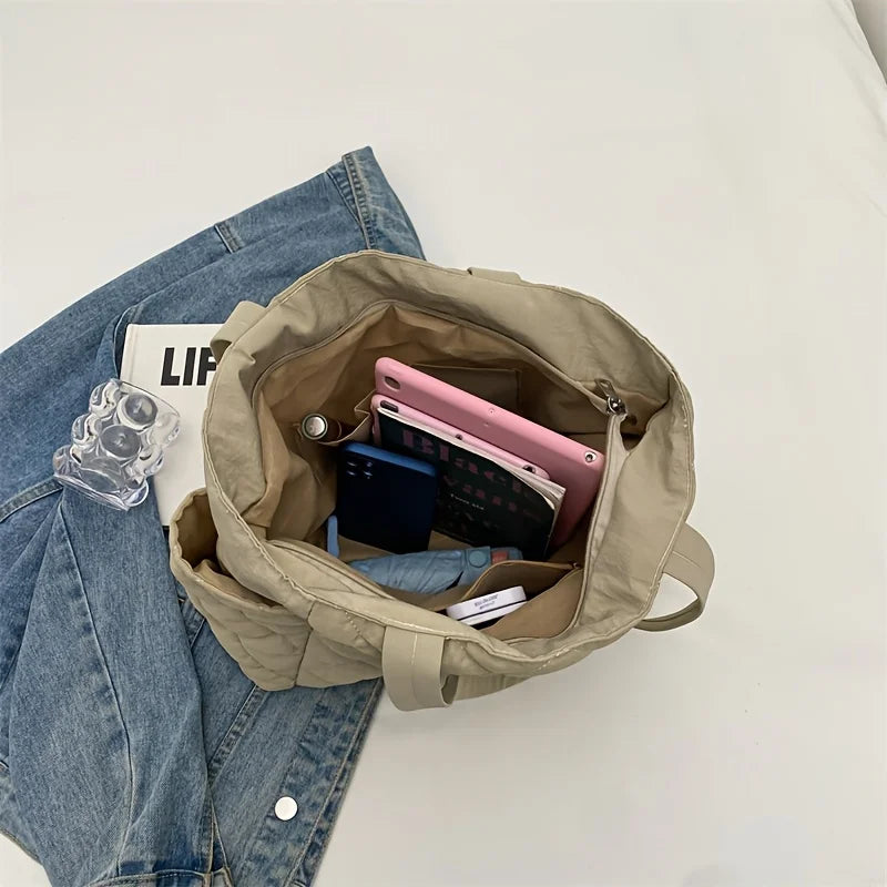 Black Large Capacity Handbag with Square Pattern, Durable Quilted Material, Multiple Pockets for Easy Storage & Cute Plush Charm.