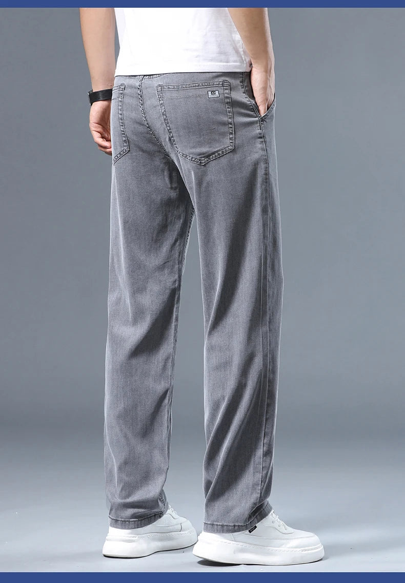 Summer Thin Men's Loose Straight Jeans Lyocell Soft Drape Business Casual Trousers Classic Smoke Gray Brand Ice Silk Pants.