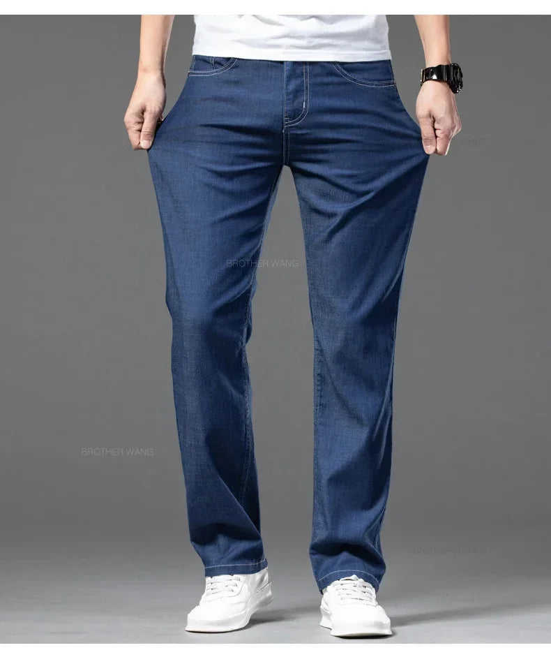 Summer Ultra Thin Men's Loose Jeans Lyocell Ice Silk Fashion Casual Business Denim Pants Straight Stretch Male Trousers.
