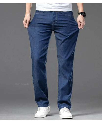 Summer Ultra Thin Men's Loose Jeans Lyocell Ice Silk Fashion Casual Business Denim Pants Straight Stretch Male Trousers.