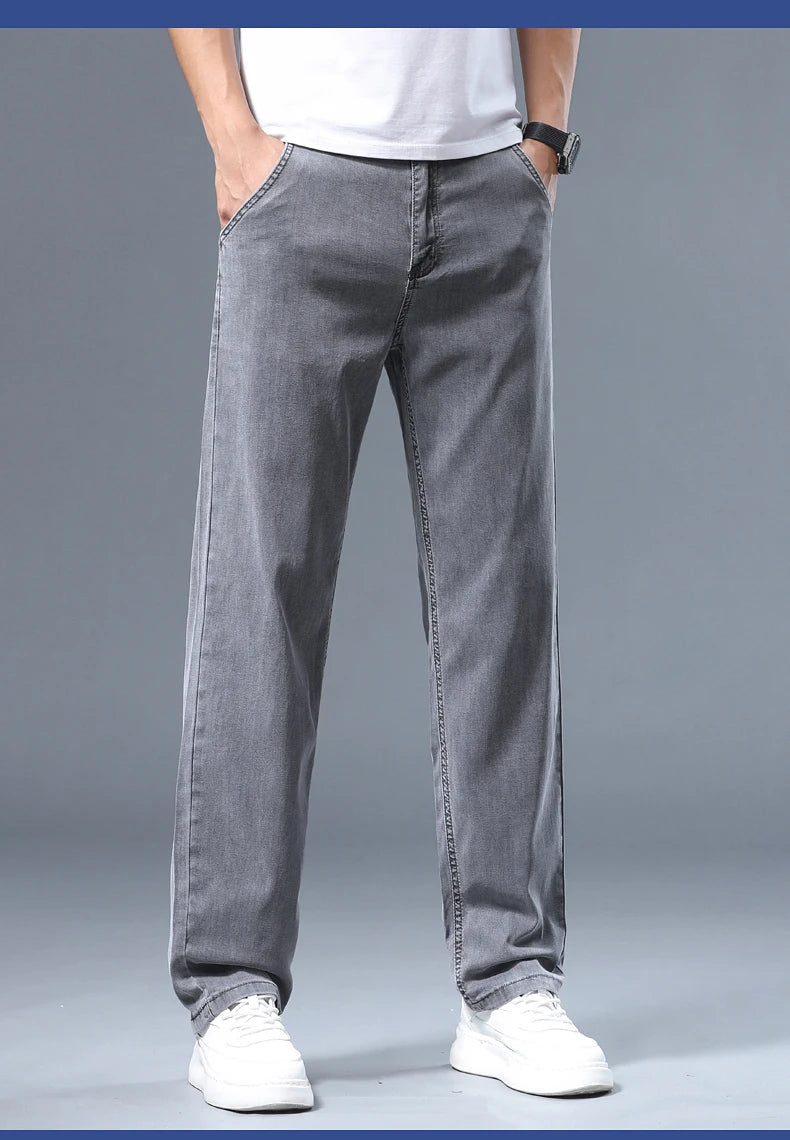 Summer Thin Men's Loose Straight Jeans Lyocell Soft Drape Business Casual Trousers Classic Smoke Gray Brand Ice Silk Pants.