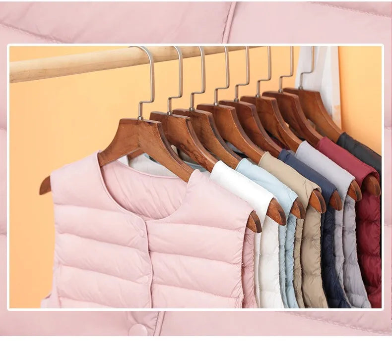 2023 Neuankömmlinge Herbst Winter warme Frauen ärmellose Daunen futter Taillen mantel weibliche ultraleichte weiße Enten Daunen weste Jacken.