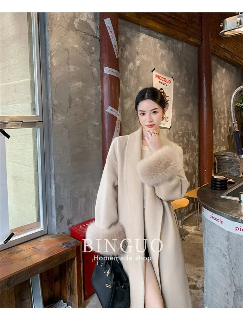 Grauer Wollmantel mit Krawatten-Taillenkollektion für Damen im Herbst und Winter 2024, neuer langärmeliger, lockerer High-End-Cape-Mantel, mittellanges Oberteil