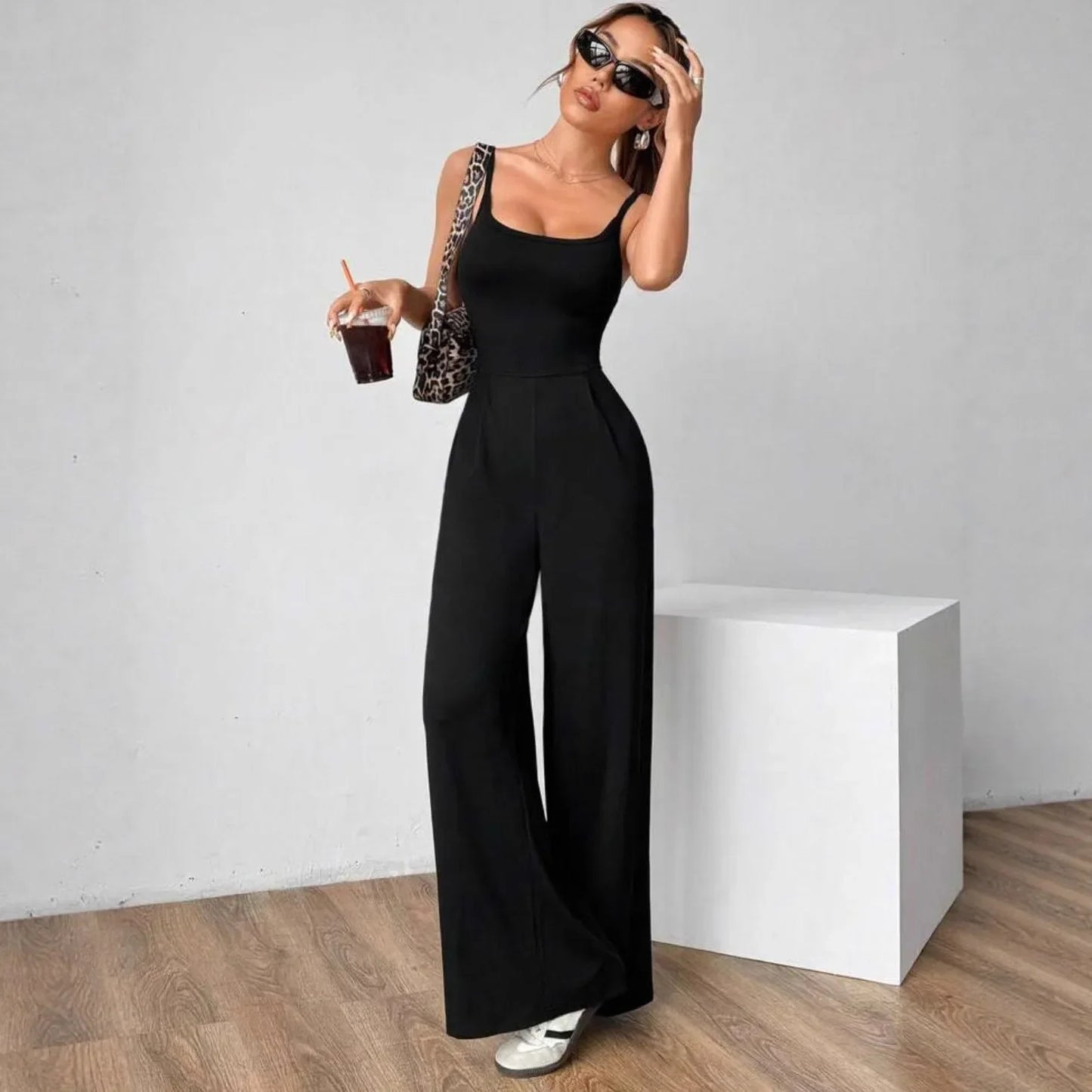 Fashionable Solid Color High Waist Bell Bottom Jumpsuit Backless Strap Casual Women's Long Pants One Piece Suit Female.