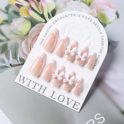24pcs(+Tools) Pearl Bow Nude Pink Press On Nails White French Fingertips Almond Full Cover Fasle Nails New Year Nail Accessories.