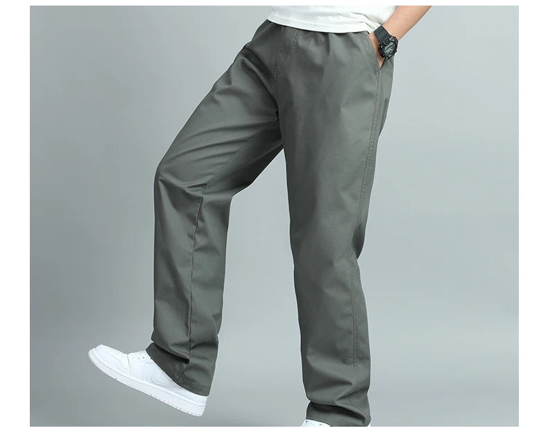 Big Size Men's Casual Cotton Trousers Loose Fit Straight Pants Multi Pocket Big Man Long Pants Mens Jogger Pants Summer Autumn.