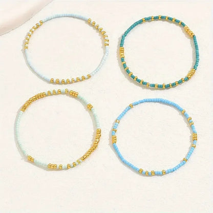 4 PCS Turquoise Color Seedbeads Stretch Bracelet Set Bohemia Gold Color Glassbeads Elastic Handmade Girls Vacation Jewelry.