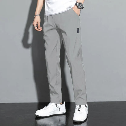 Ice Silk Men's Pants 2024 Summer New Black Gray Thin Business Casual Pants Outdoor Elastic Breathable Straight Leg Sweatpants.